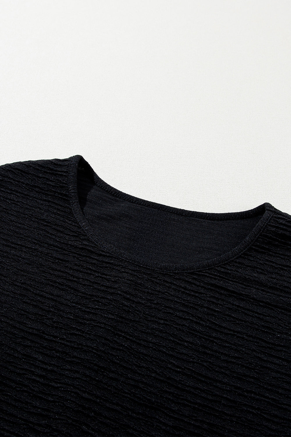 Black Solid Textured Ruffled Short Sleeve Blouse