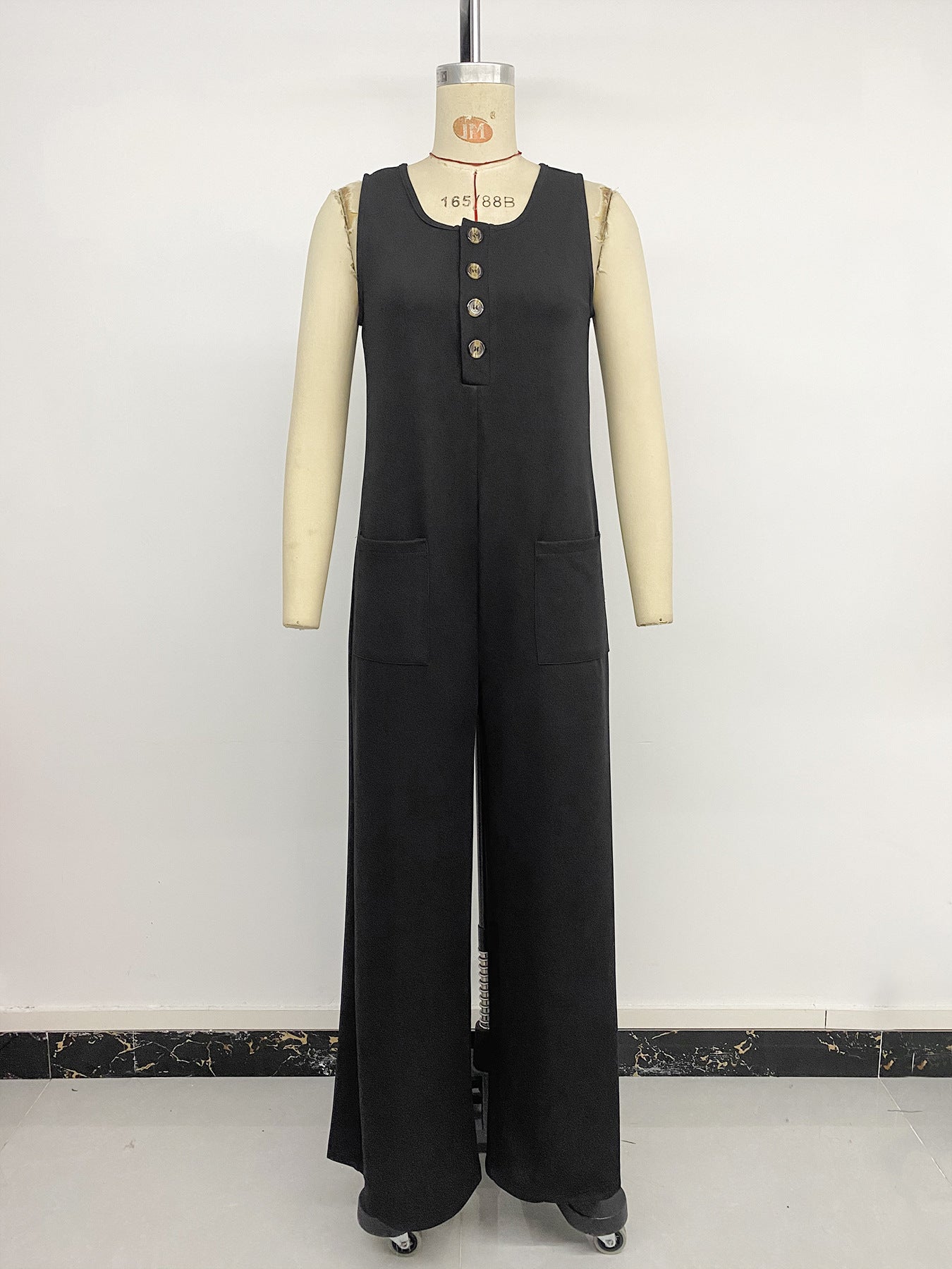 Women's Loose Sleeveless Solid Color Pocket Button Jumpsuit